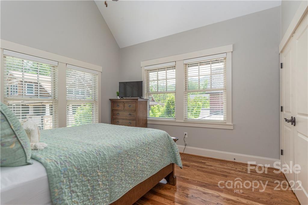 7 Fitzgerald Road Black Mountain, NC 28711 - Photo 17 of 23 a bedroom with a bed and wooden floor