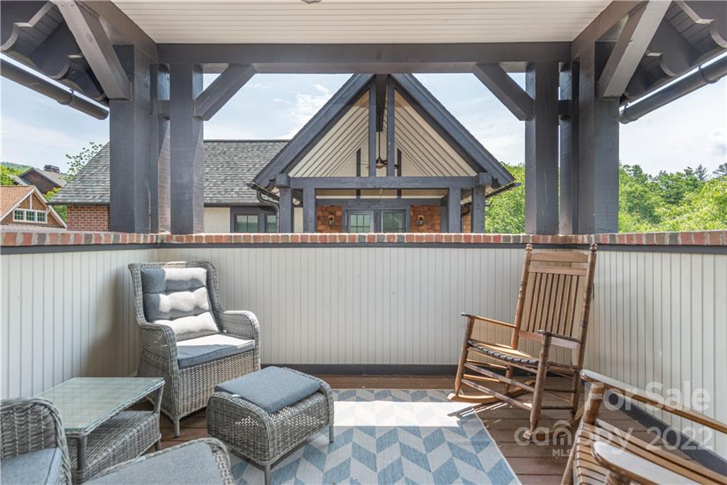 7 Fitzgerald Road Black Mountain, NC 28711 - Photo 19 of 23 a view of a patio with couches chairs and wooden floor