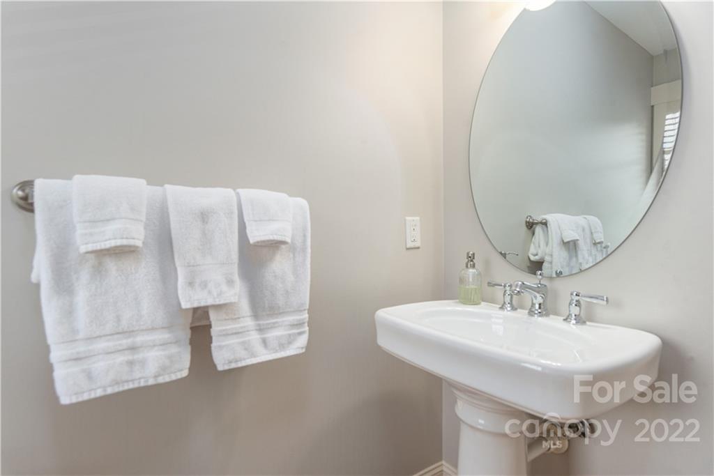 7 Fitzgerald Road Black Mountain, NC 28711 - Photo 21 of 23 a bathroom with a sink and mirror