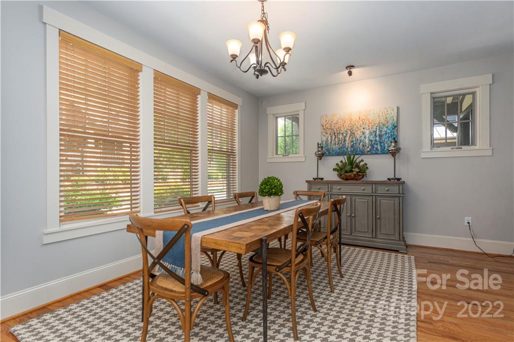 7 Fitzgerald Road Black Mountain, NC 28711 - Photo 3 of 23 a view of a dining room with furniture and a chandelier