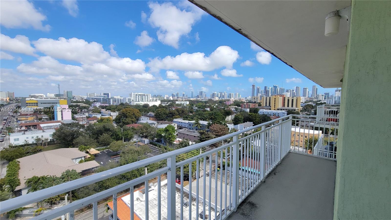 219 Northwest 12th Avenue, Unit 1004 Miami, FL 33128 - Photo 2 of 10 a view of city from balcony