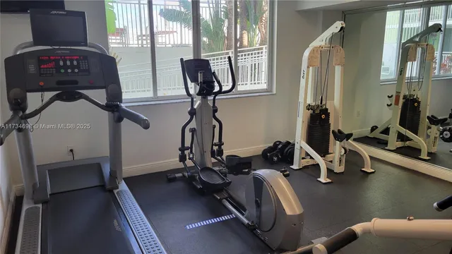 a view of a room with gym equipment