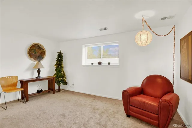 a view of a livingroom with furniture