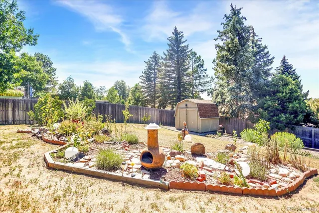 a view of a swimming pool with an outdoor space