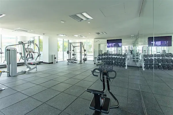 a view of a room with gym equipment