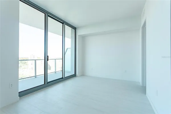 an empty room with windows