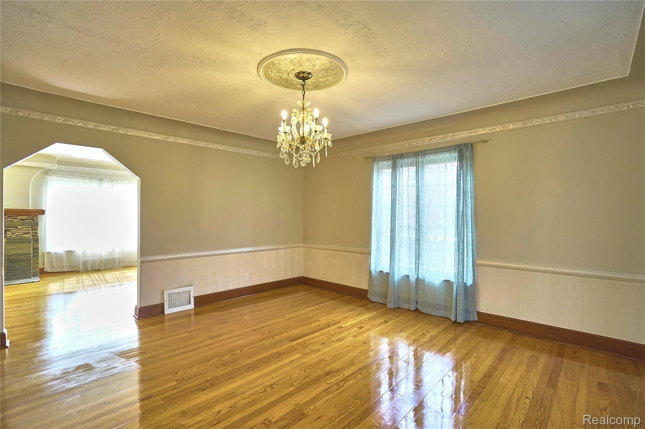 1430 Devonshire Road Grosse Pointe, MI 48230 - Photo 19 of 85 Large formal dining room with plaster cove and ceiling medallion