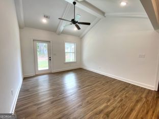 1333 Mooty Bridge Road, Unit 2 LaGrange, GA 30240 - Photo 14 of 17 wooden floor in an empty room with a window