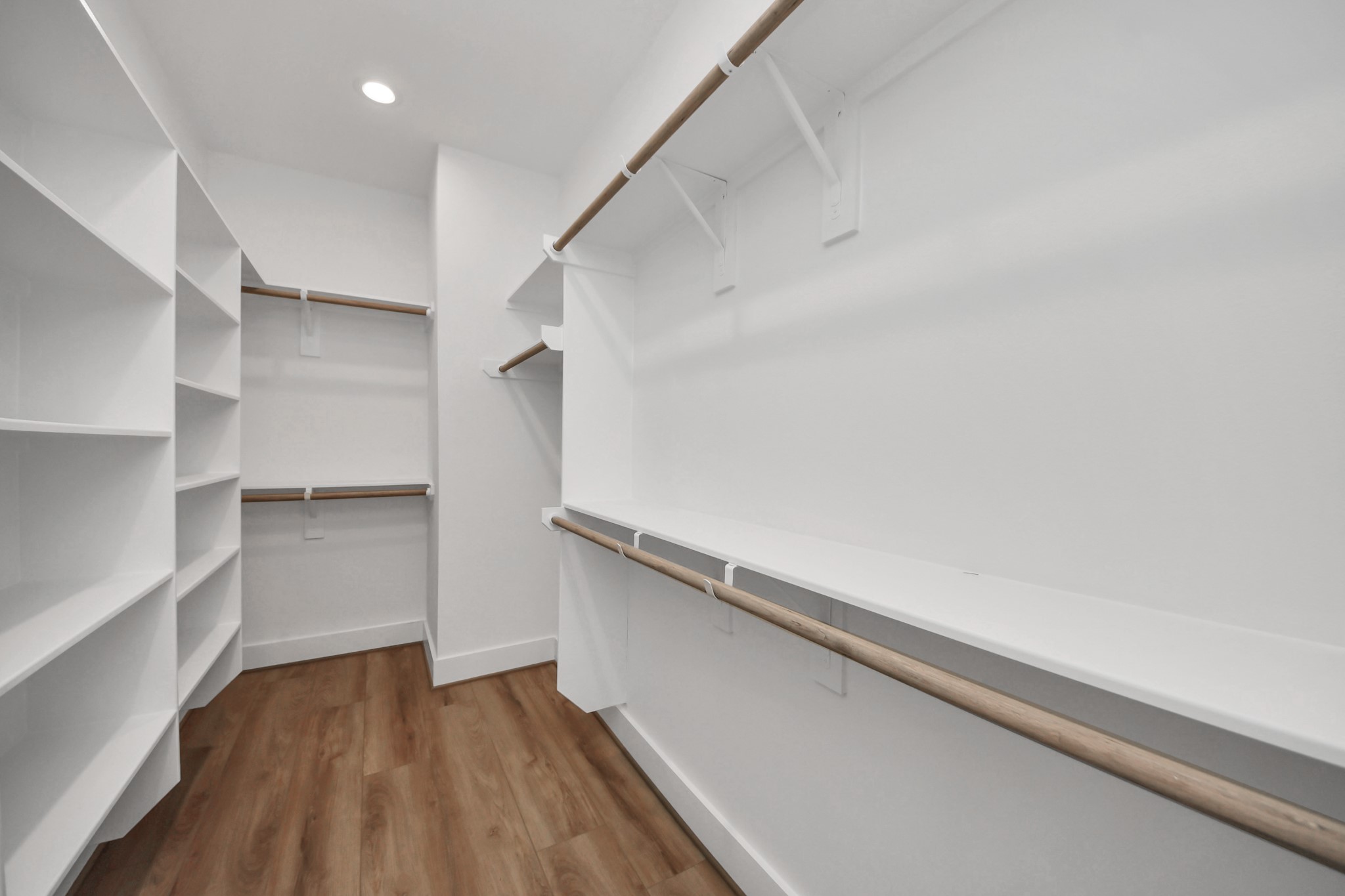 505 Middle Street Houston, TX 77003 - Photo 29 of 46 Discover your dream wardrobe space in this spacious walk-in closet, featuring sleek shelving and abundant hanging space, perfect for organizing your fashion treasures.