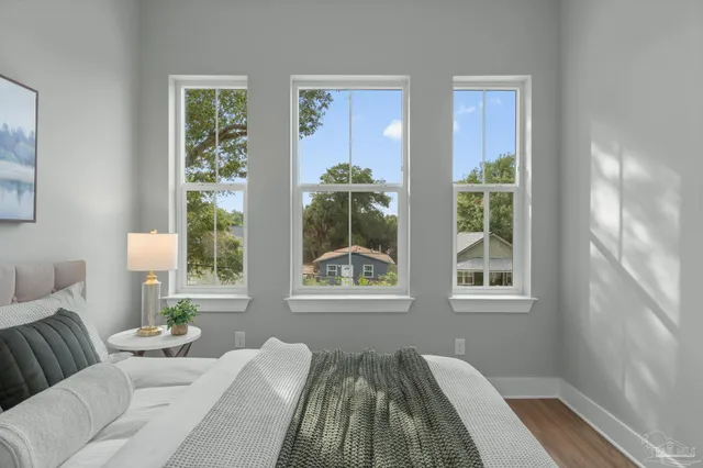 a living room with furniture and a window