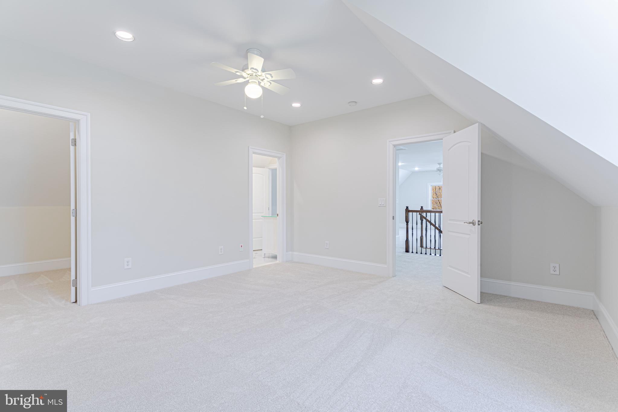 1206 Summit Road McLean, VA 22101 - Photo 30 of 45 a view of an empty room with a chandelier fan