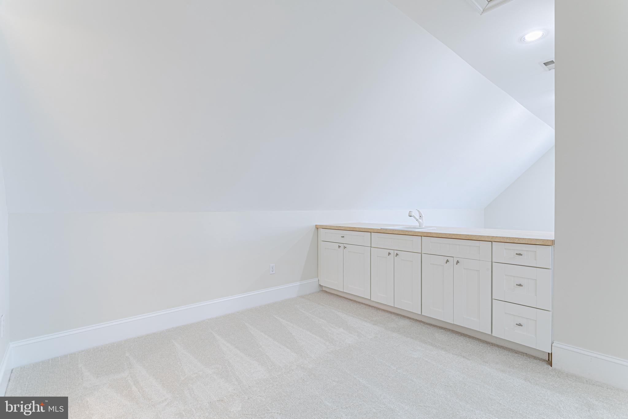 1206 Summit Road McLean, VA 22101 - Photo 34 of 45 a view of white cabinet