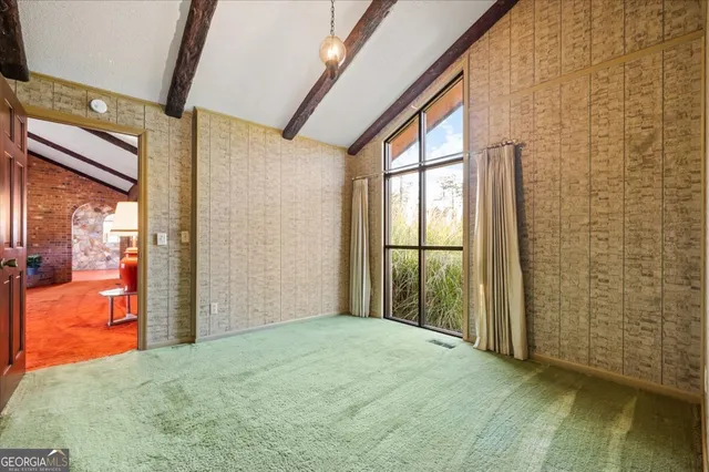 a view of a room with an empty space