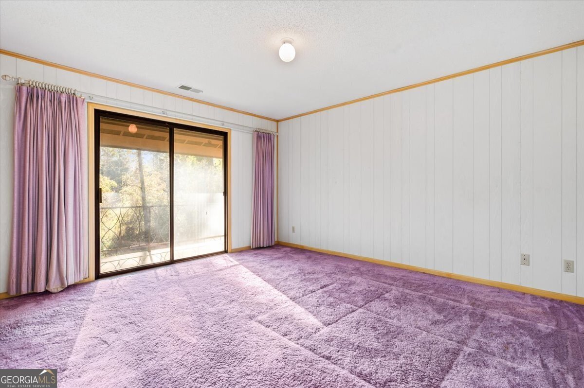 2066 Cherokee Street Waycross, GA 31503 - Photo 35 of 56 an empty room with windows
