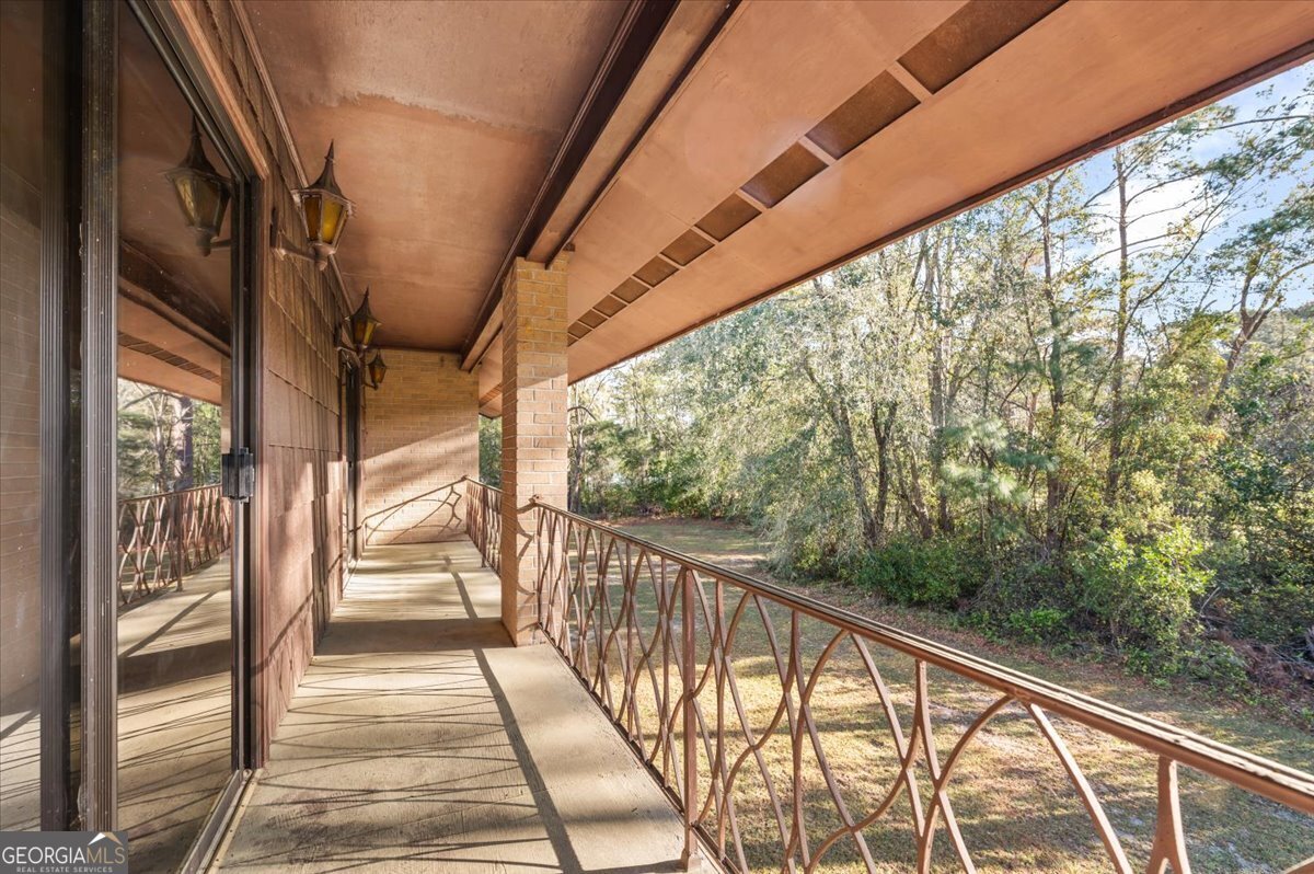 2066 Cherokee Street Waycross, GA 31503 - Photo 37 of 56 a view of balcony with wooden floor