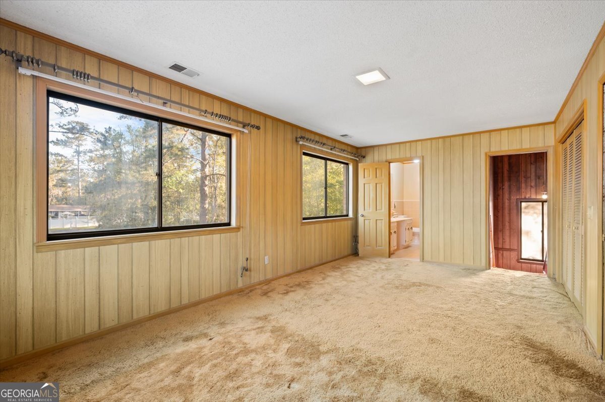 2066 Cherokee Street Waycross, GA 31503 - Photo 43 of 56 a view of an empty room with a window