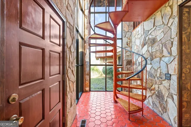 a view of an empty room and window