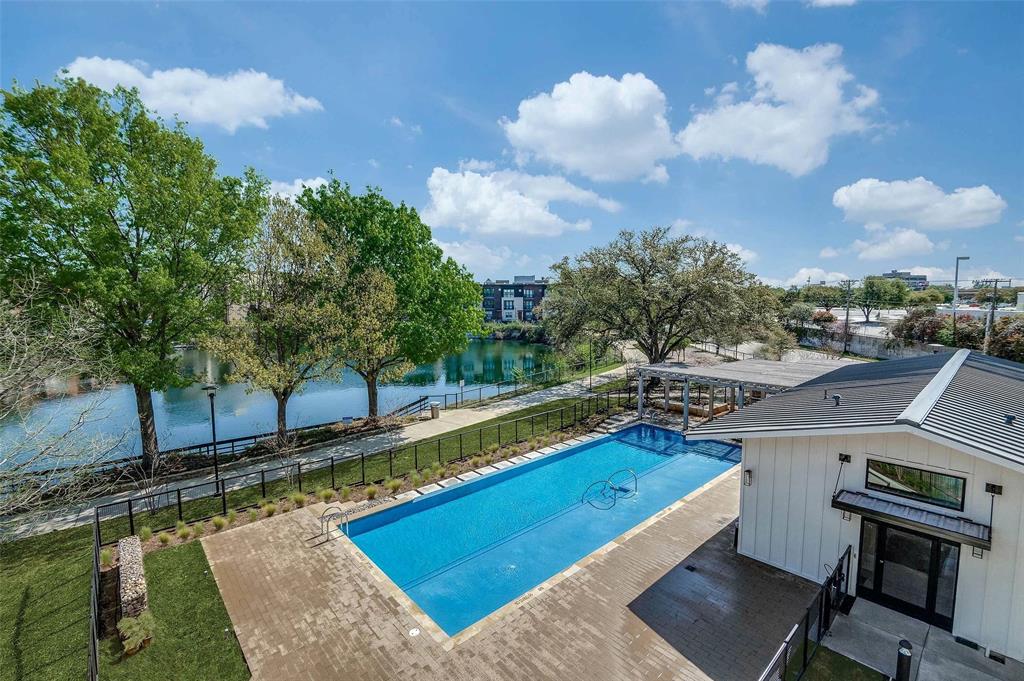 4020 McEwen Road, Unit 9123 Farmers Branch, TX 75244 - Photo 11 of 20 View of pool featuring a water view and a patio area