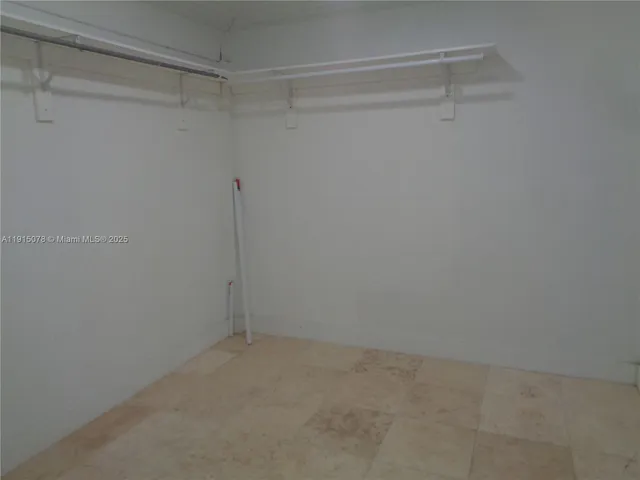 a bathroom with a sink vanity and a mirror