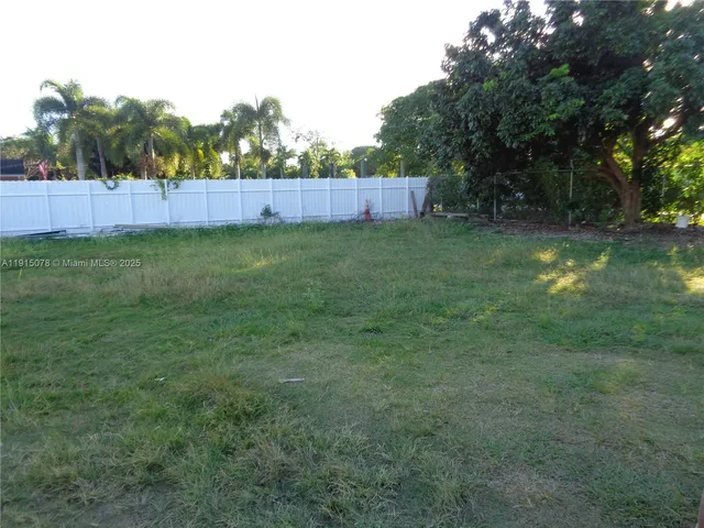 a view of deck in the backyard