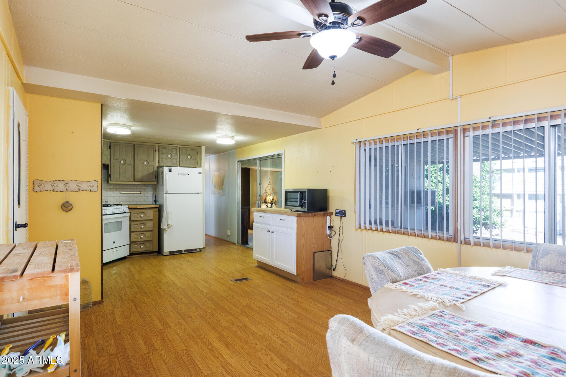 2100 North Trekell Road, Unit 351 Casa Grande, AZ 85122 - Photo 14 of 31 a bedroom with furniture and a wooden floor