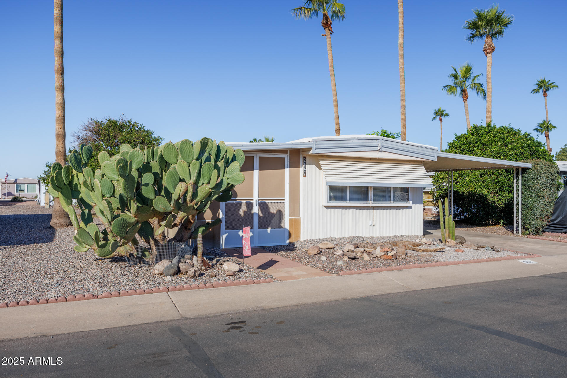2100 North Trekell Road, Unit 351 Casa Grande, AZ 85122 - Photo 2 of 31 a front view of a house with plant