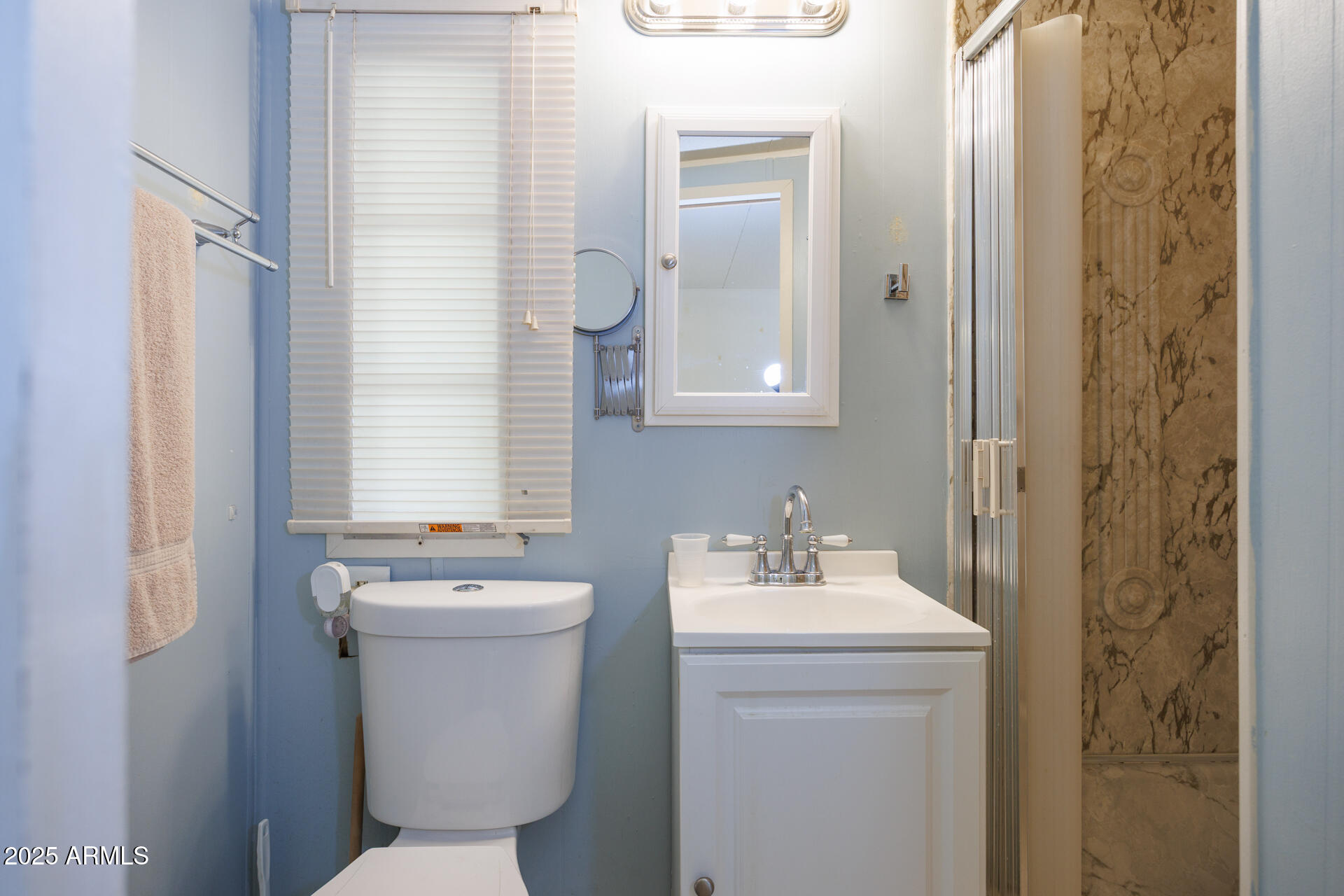 2100 North Trekell Road, Unit 351 Casa Grande, AZ 85122 - Photo 22 of 31 a bathroom with a sink toilet and shower