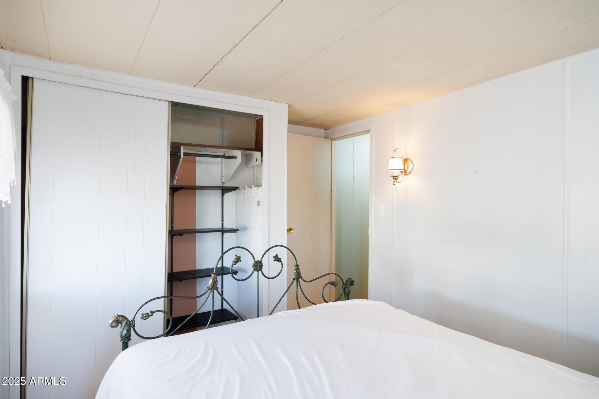 2100 North Trekell Road, Unit 351 Casa Grande, AZ 85122 - Photo 26 of 31 a bedroom with a bed and a large window