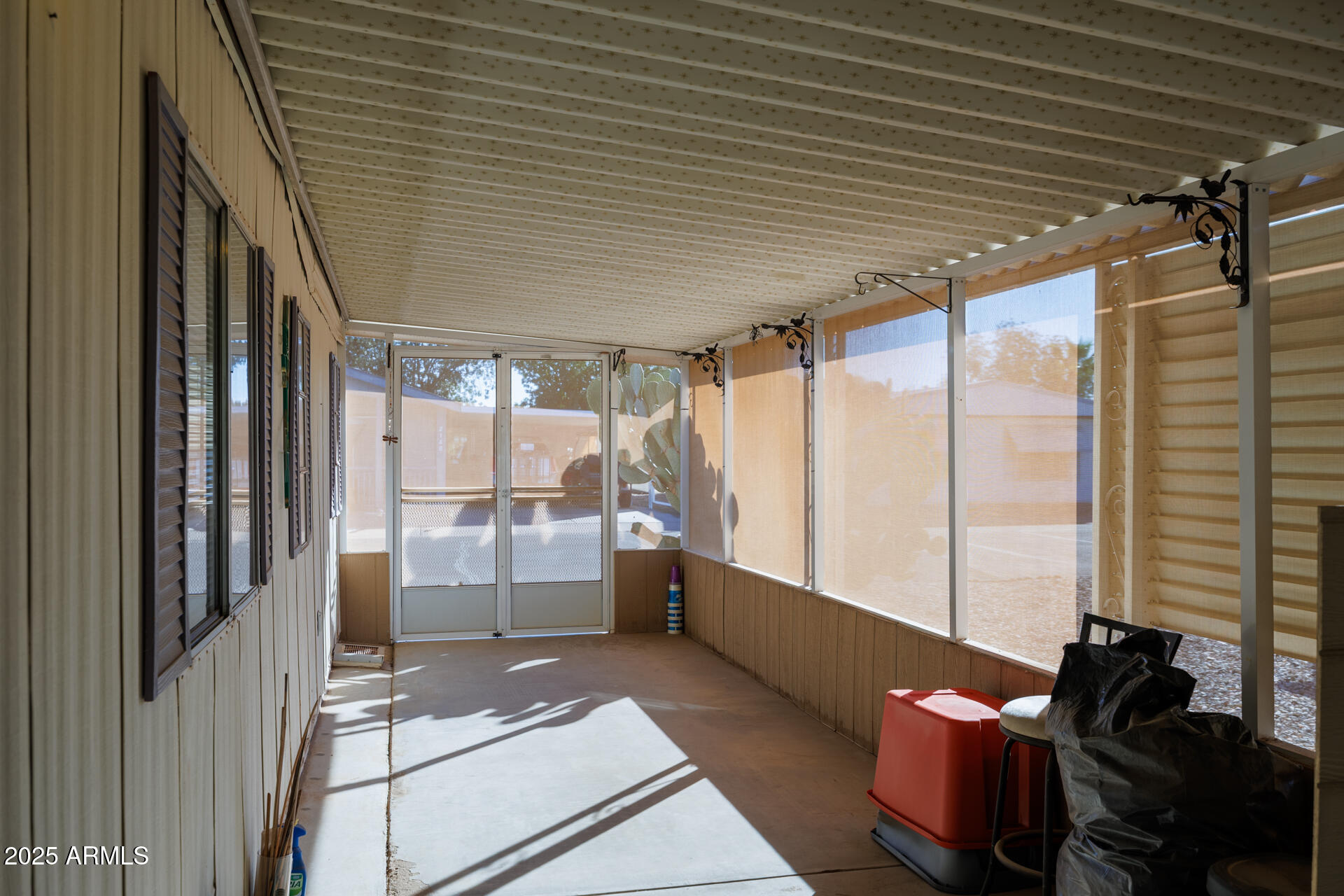 2100 North Trekell Road, Unit 351 Casa Grande, AZ 85122 - Photo 6 of 31 a room with lots of wooden furniture and windows