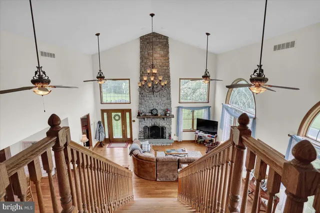 a view of living room kitchen and dining room