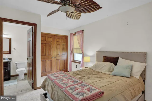 a view of a livingroom with furniture and a floor to ceiling
