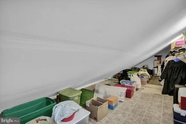 a bathroom with a sink toilet and mirror