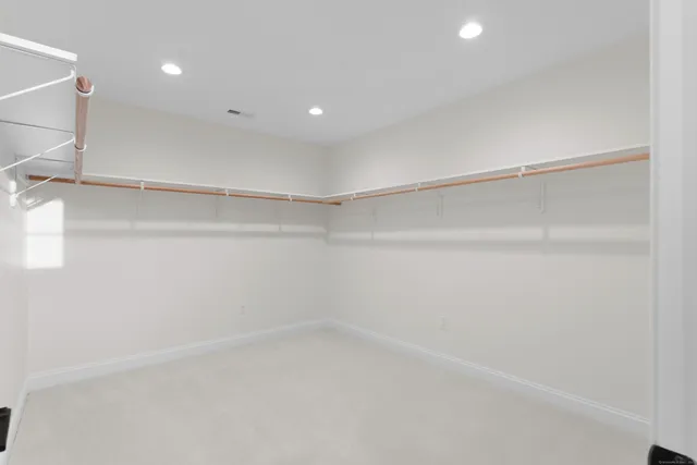 a kitchen with cabinets appliances and a