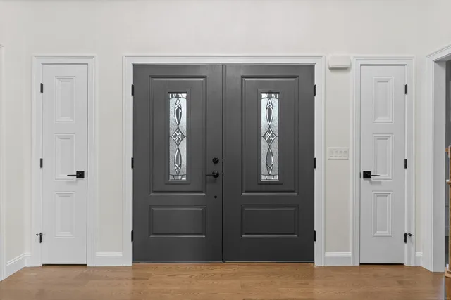 a kitchen with cabinets and appliances