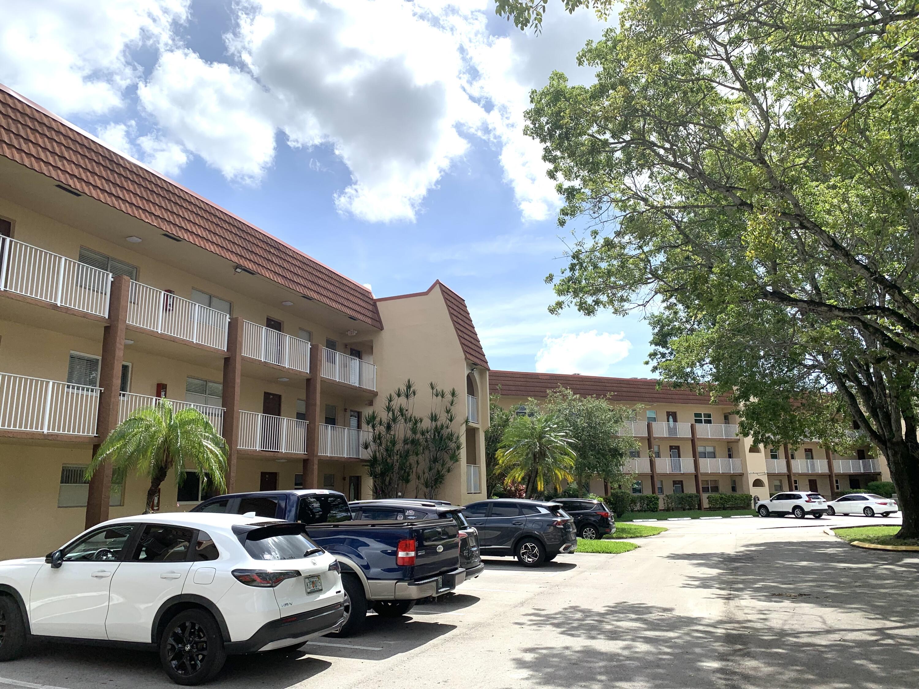 2801 North Pine Island Road, Unit 110 Sunrise, FL 33322 - Photo 22 of 26 IMG_2862 building