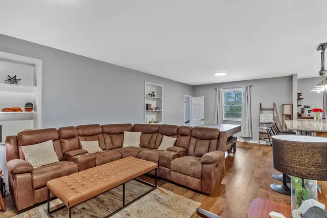 a living room with furniture and a couch