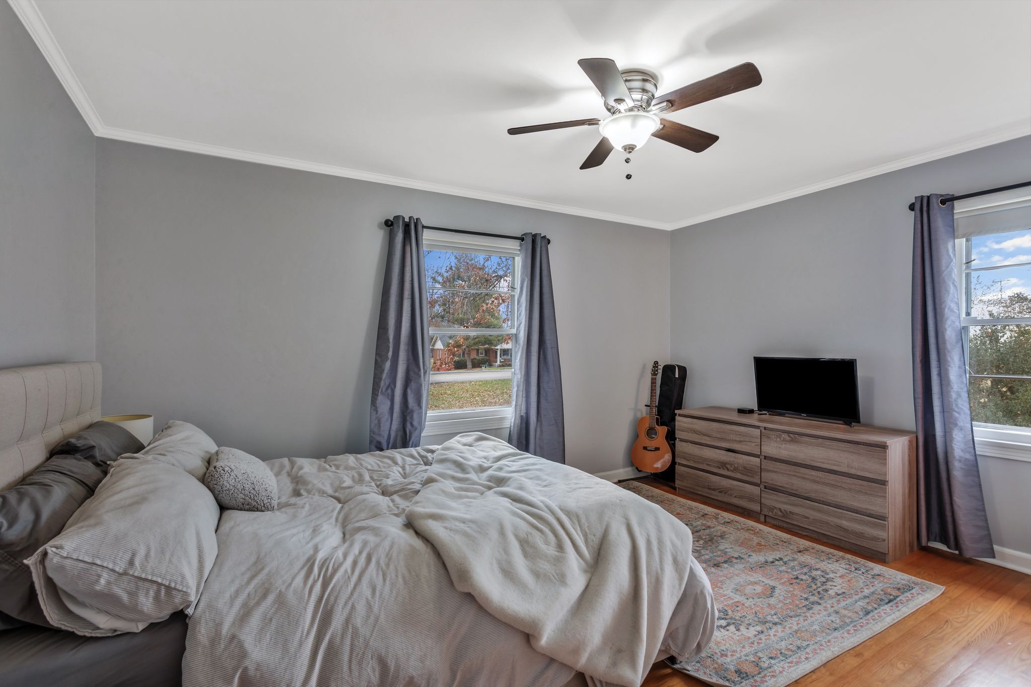 124 North Laurel Circle Columbia, TN 38401 - Photo 24 of 40 a bedroom with a bed and a flat screen tv