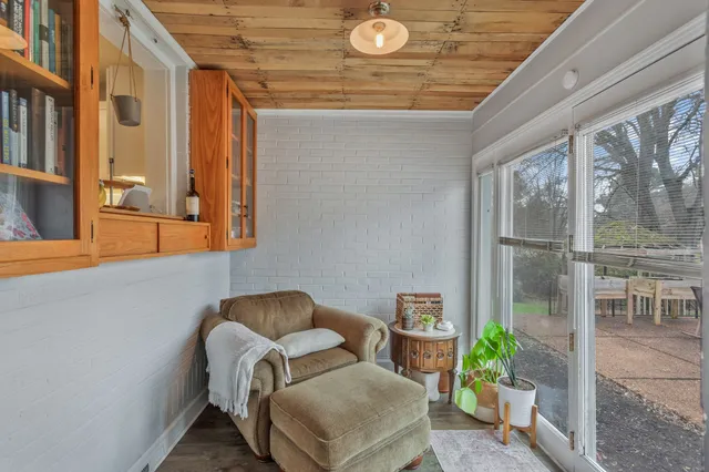 a outdoor living space with furniture and a potted plant