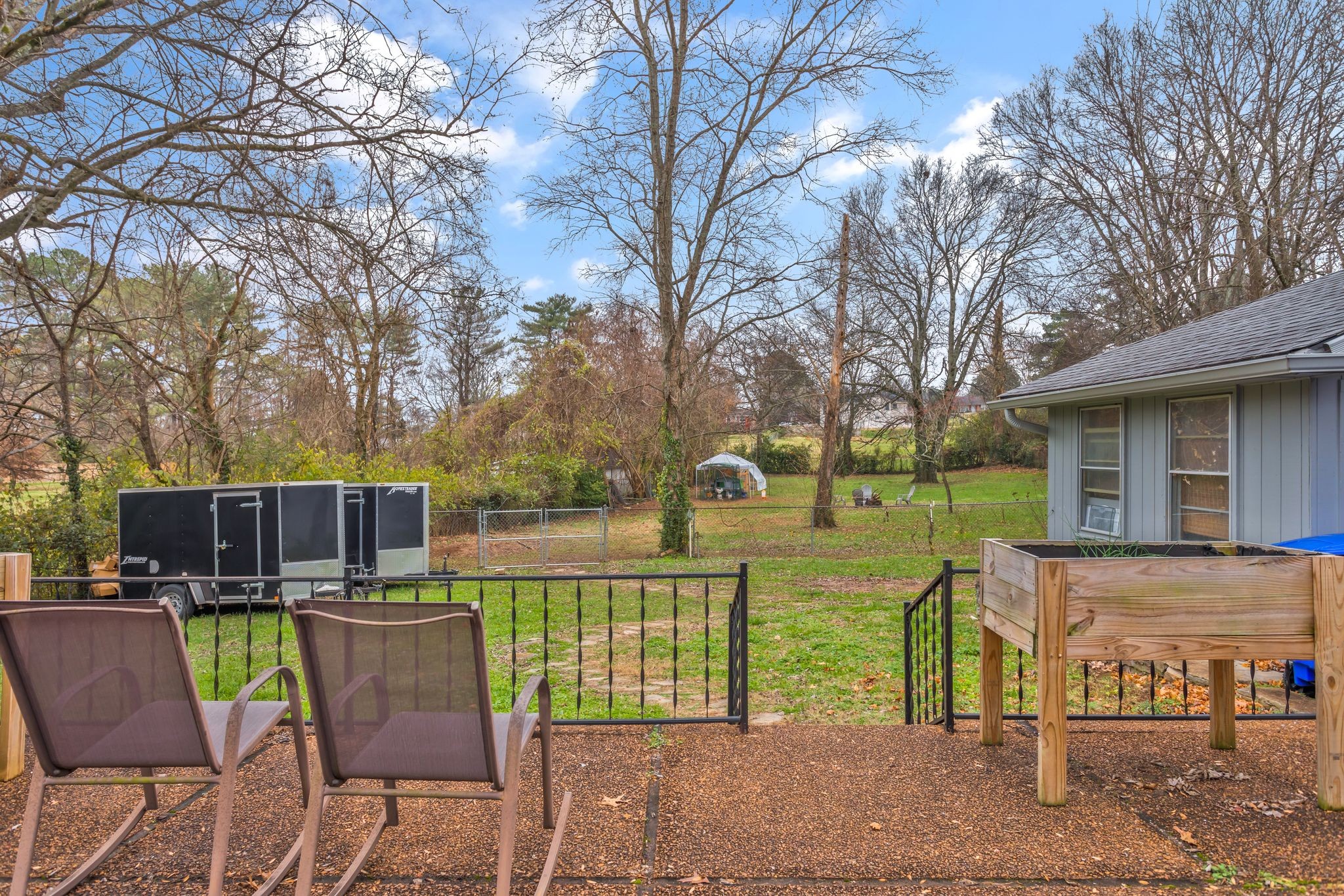 124 North Laurel Circle Columbia, TN 38401 - Photo 30 of 40 a view of a house with backyard and chairs
