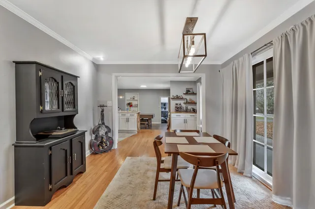 a view of a dining room with furniture