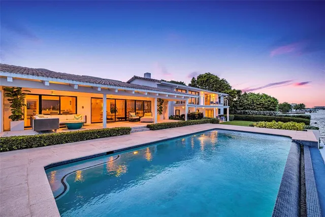 a view of a couches and table in the patio