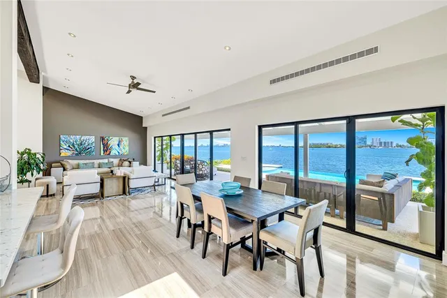 a backyard of a house with outdoor seating