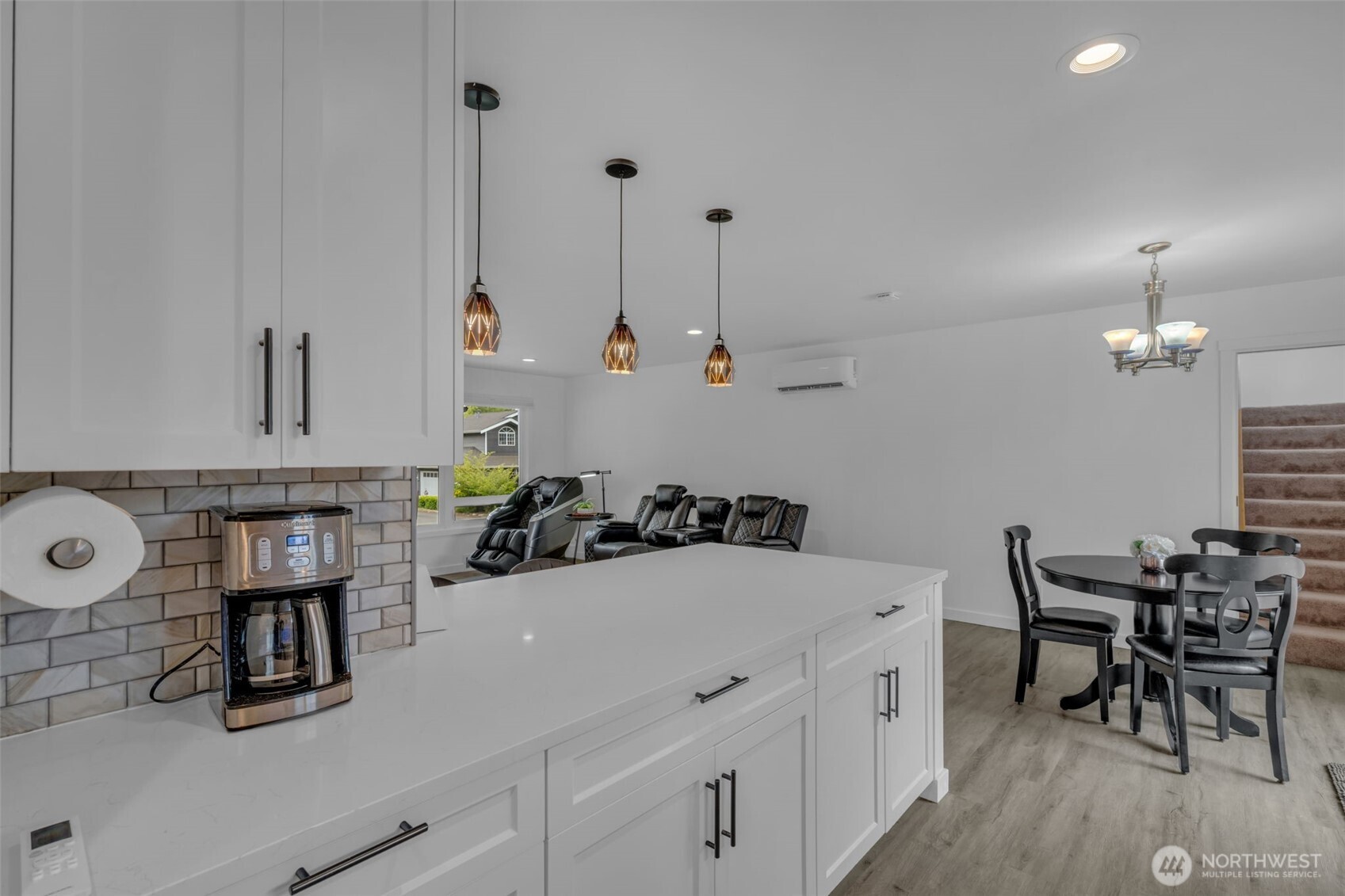 9015 218th Street Southwest Edmonds, WA 98026 - Photo 17 of 39 a kitchen with a sink a table and chairs