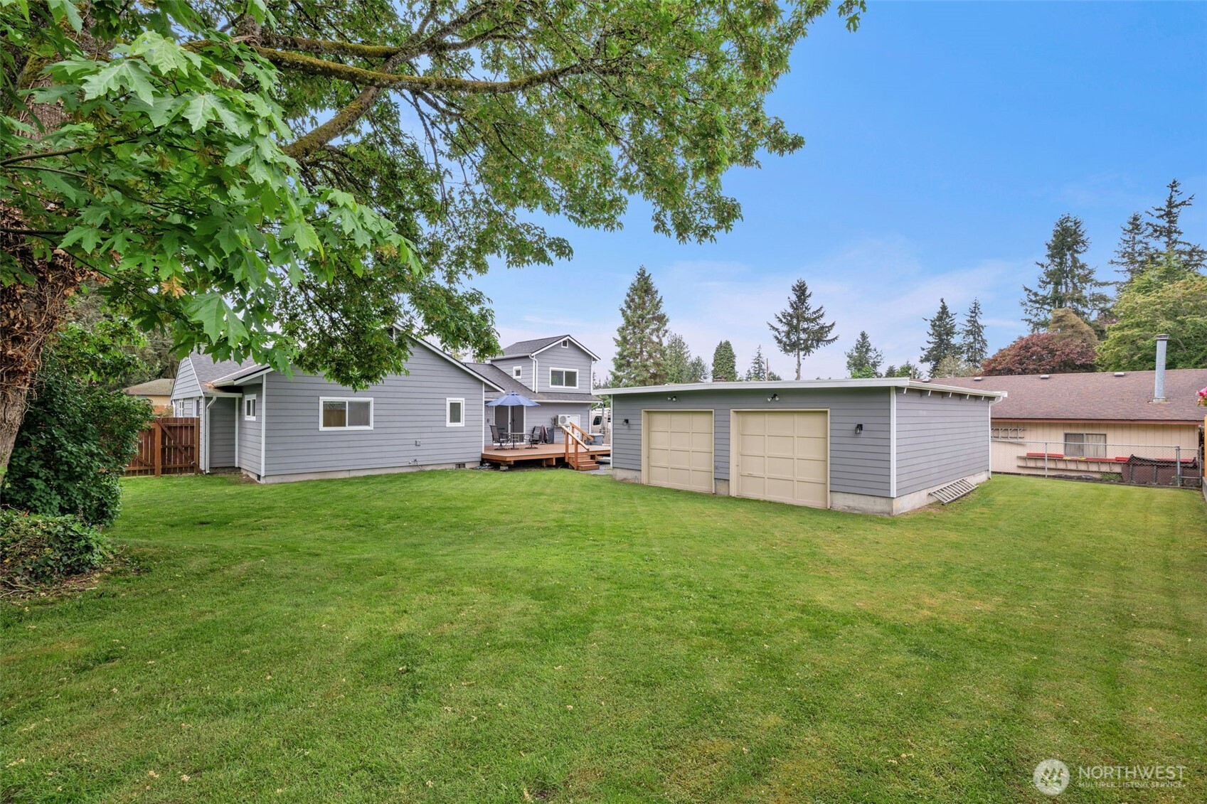 9015 218th Street Southwest Edmonds, WA 98026 - Photo 2 of 39 a view of a house with a yard and a tree