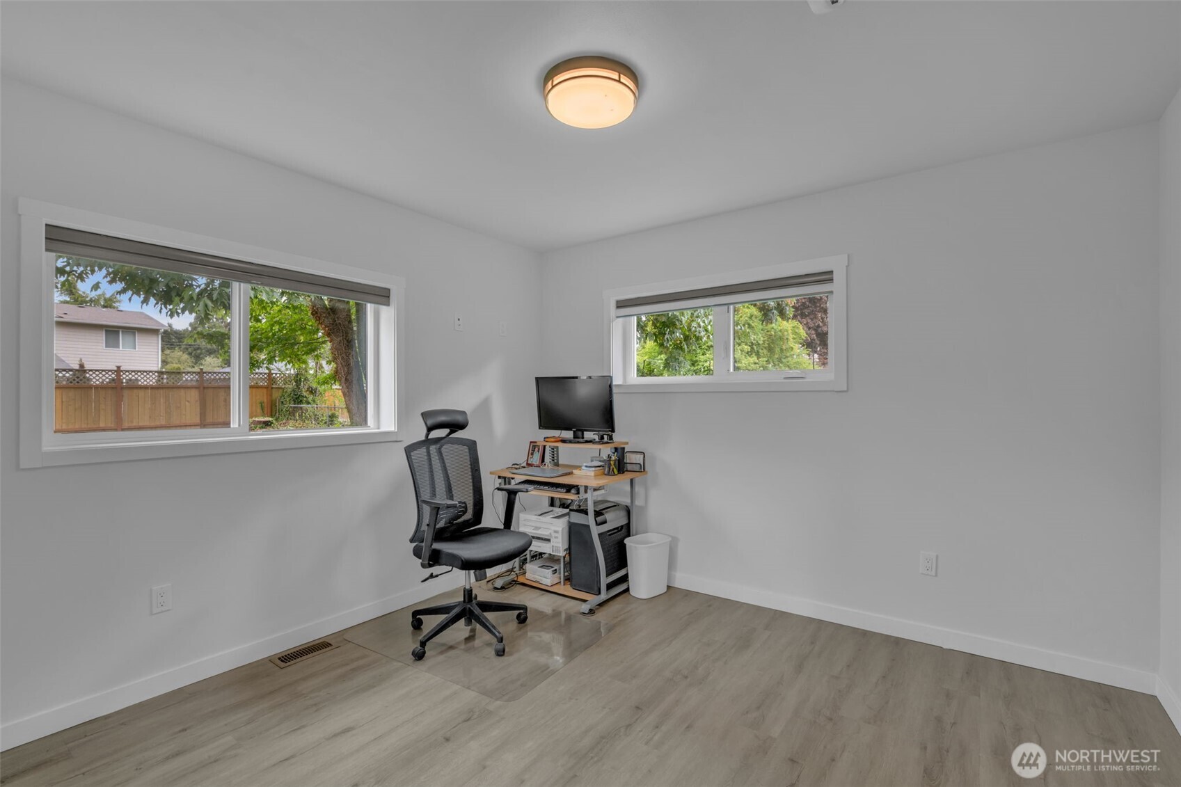 9015 218th Street Southwest Edmonds, WA 98026 - Photo 26 of 39 a view of a workspace with furniture and a window