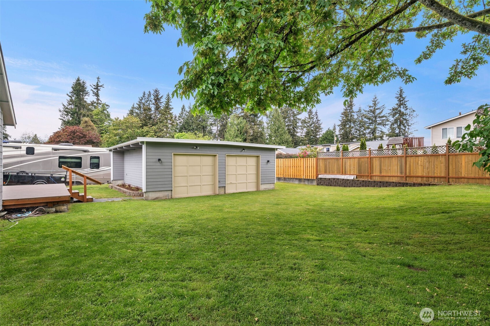 9015 218th Street Southwest Edmonds, WA 98026 - Photo 34 of 39 a view of a backyard with a garden and plants