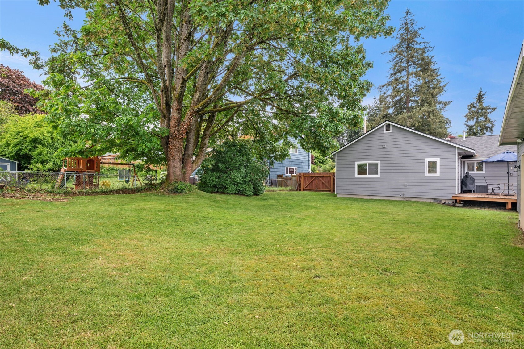 9015 218th Street Southwest Edmonds, WA 98026 - Photo 35 of 39 a front view of a house with garden