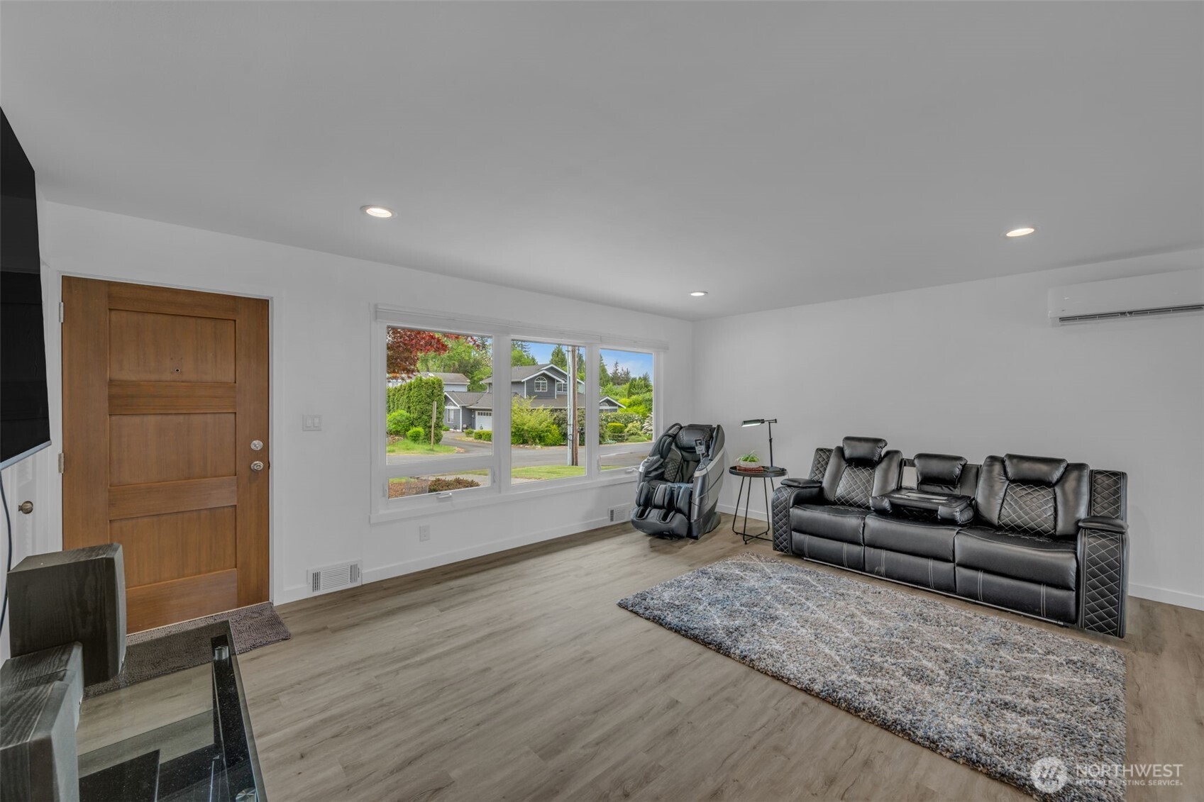 9015 218th Street Southwest Edmonds, WA 98026 - Photo 7 of 39 a living room with furniture and a flat screen tv