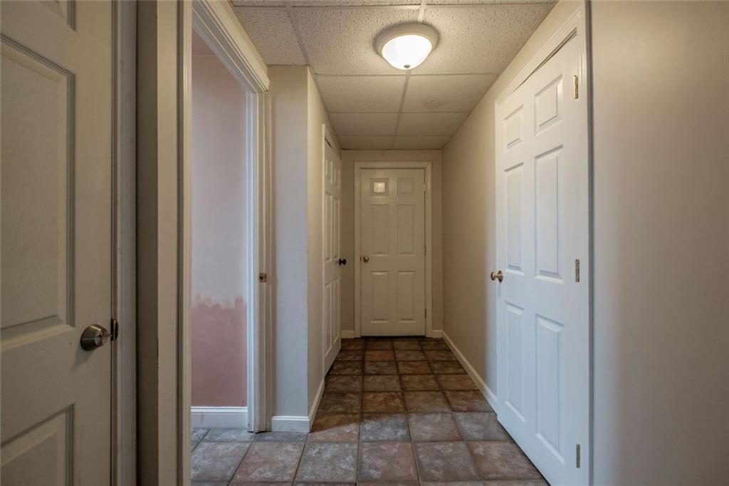 576 Long Plains Road Buxton, ME 04093 - Photo 9 of 35 Door on the left is a closet, stairs...