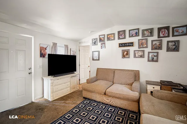 a living room with furniture and a couch
